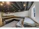 Finished basement with built-in seating and a unique design at 1151 Ruby Nelson Ct, Lawrenceville, GA 30043