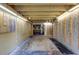 Unfinished basement workshop with built-in shelving at 1151 Ruby Nelson Ct, Lawrenceville, GA 30043