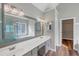 Bathroom boasts double sinks, a soaking tub, and a separate shower at 1151 Ruby Nelson Ct, Lawrenceville, GA 30043