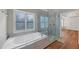 Relaxing bathroom with a jetted tub and a large walk-in shower at 1151 Ruby Nelson Ct, Lawrenceville, GA 30043