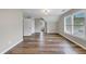 Spacious bedroom with wood-look floors and a large window at 1151 Ruby Nelson Ct, Lawrenceville, GA 30043