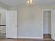 Spacious bedroom with hardwood floors and neutral walls at 1151 Ruby Nelson Ct, Lawrenceville, GA 30043