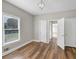 Bright bedroom with hardwood floors and double closets at 1151 Ruby Nelson Ct, Lawrenceville, GA 30043