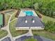 Community pool and clubhouse with surrounding green space at 1151 Ruby Nelson Ct, Lawrenceville, GA 30043
