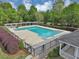 Resort-style community pool with pergola and fence at 1151 Ruby Nelson Ct, Lawrenceville, GA 30043