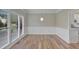 Bright dining room featuring hardwood floors and wainscoting at 1151 Ruby Nelson Ct, Lawrenceville, GA 30043