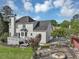 House exterior showcasing backyard and firepit at 1151 Ruby Nelson Ct, Lawrenceville, GA 30043