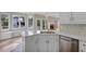 Bright kitchen with white cabinets, stainless steel appliances, and breakfast nook at 1151 Ruby Nelson Ct, Lawrenceville, GA 30043
