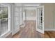 Bright living room with hardwood floors and French doors at 1151 Ruby Nelson Ct, Lawrenceville, GA 30043