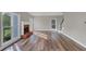 Spacious living room with hardwood floors and fireplace at 1151 Ruby Nelson Ct, Lawrenceville, GA 30043