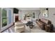 Living room features a fireplace and large windows at 1151 Ruby Nelson Ct, Lawrenceville, GA 30043