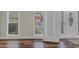 Bright living room with hardwood floors and french doors at 1151 Ruby Nelson Ct, Lawrenceville, GA 30043