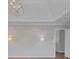 Main bedroom with high ceilings, neutral walls, and hardwood floors at 1151 Ruby Nelson Ct, Lawrenceville, GA 30043