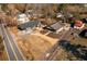 Aerial view showing a renovated house and additional building at 1404 Cassville Nw Rd, Cartersville, GA 30121