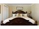 Main bedroom with king-size bed and decorative pillows at 1404 Cassville Nw Rd, Cartersville, GA 30121
