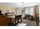 Cozy bedroom with a sleigh bed and window seating at 1404 Cassville Nw Rd, Cartersville, GA 30121