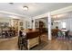 Open concept dining area with hardwood floors and a large island at 1404 Cassville Nw Rd, Cartersville, GA 30121