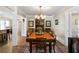 Elegant dining room with a large wood table and chandelier at 1404 Cassville Nw Rd, Cartersville, GA 30121