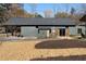Renovated building with large doors, sitting on a landscaped lot at 1404 Cassville Nw Rd, Cartersville, GA 30121