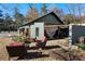 Charming home exterior with a patio seating area at 1404 Cassville Nw Rd, Cartersville, GA 30121