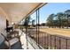 Relaxing front porch with rocking chairs and views of the yard at 1404 Cassville Nw Rd, Cartersville, GA 30121