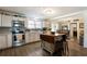Bright kitchen with stainless steel appliances and island at 1404 Cassville Nw Rd, Cartersville, GA 30121