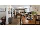 Updated kitchen with white cabinets, wood island, and view to dining area at 1404 Cassville Nw Rd, Cartersville, GA 30121