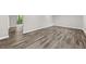 Spacious finished basement with wood-look tile flooring at 1730 Salina Dr, Jonesboro, GA 30236
