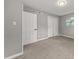 Bright bedroom featuring carpet and double closets at 1730 Salina Dr, Jonesboro, GA 30236