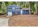 Newly renovated blue house with a spacious yard at 1730 Salina Dr, Jonesboro, GA 30236