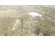 Aerial view showing a house nestled in a wooded area at 295 Hiram Acworth Hwy, Hiram, GA 30141