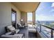 Relaxing balcony boasting stunning city views and outdoor furniture at 3376 Peachtree Ne Rd # 47A, Atlanta, GA 30326