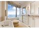 Bathroom with double vanities, soaking tub, and city view at 3376 Peachtree Ne Rd # 47A, Atlanta, GA 30326