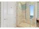 Large walk-in shower with glass enclosure and city views at 3376 Peachtree Ne Rd # 47A, Atlanta, GA 30326