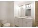 Modern bathroom with double vanity and updated fixtures at 5359 Megan Rd, Stone Mountain, GA 30088