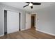 Well-lit bedroom with double doors leading to closet and bathroom at 5359 Megan Rd, Stone Mountain, GA 30088