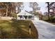 House with driveway and lawn at 5359 Megan Rd, Stone Mountain, GA 30088