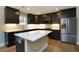 Modern kitchen with stainless steel appliances and island at 5359 Megan Rd, Stone Mountain, GA 30088