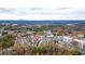 Aerial view of a residential neighborhood with trees and homes at 212 Mcaffee St, Woodstock, GA 30188