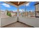 Balcony with wood ceiling, white siding, and neighborhood view at 212 Mcaffee St, Woodstock, GA 30188