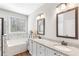 Bathroom with double vanity, granite countertop, and soaking tub at 260 Harmony Woods Dr, Dallas, GA 30157