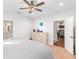 Main bedroom with ceiling fan and large dresser at 260 Harmony Woods Dr, Dallas, GA 30157