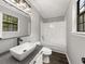 Modern bathroom with updated vanity and fixtures at 3665 Sharon Dr, Powder Springs, GA 30127