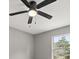 Bedroom with ceiling fan and window at 3665 Sharon Dr, Powder Springs, GA 30127