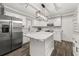 Spacious kitchen with island and stainless steel appliances at 3665 Sharon Dr, Powder Springs, GA 30127