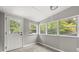 Charming sunroom with a view and exterior access at 3665 Sharon Dr, Powder Springs, GA 30127
