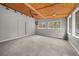 Sunroom with carpet flooring, ceiling fan, and windows at 3665 Sharon Dr, Powder Springs, GA 30127