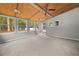 Sunroom with carpet, ceiling fan and backyard access at 3665 Sharon Dr, Powder Springs, GA 30127