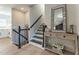 Stylish entryway with console table and staircase view at 6856 Womack Ct, Peachtree Corners, GA 30360