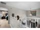 Upstairs hallway with access to bedrooms at 184 Silverleaf Ln, Dallas, GA 30157